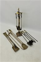 Lot 1170 - Set of four brass fire irons on stand, 81cm...