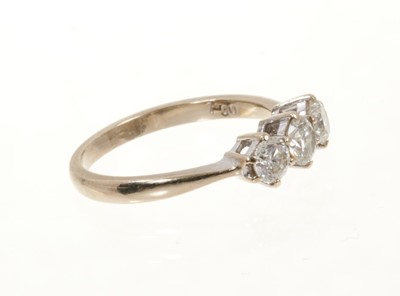 Lot 494 - Diamond three stone ring with three brilliant cut diamonds in claw setting on 18ct white gold shank