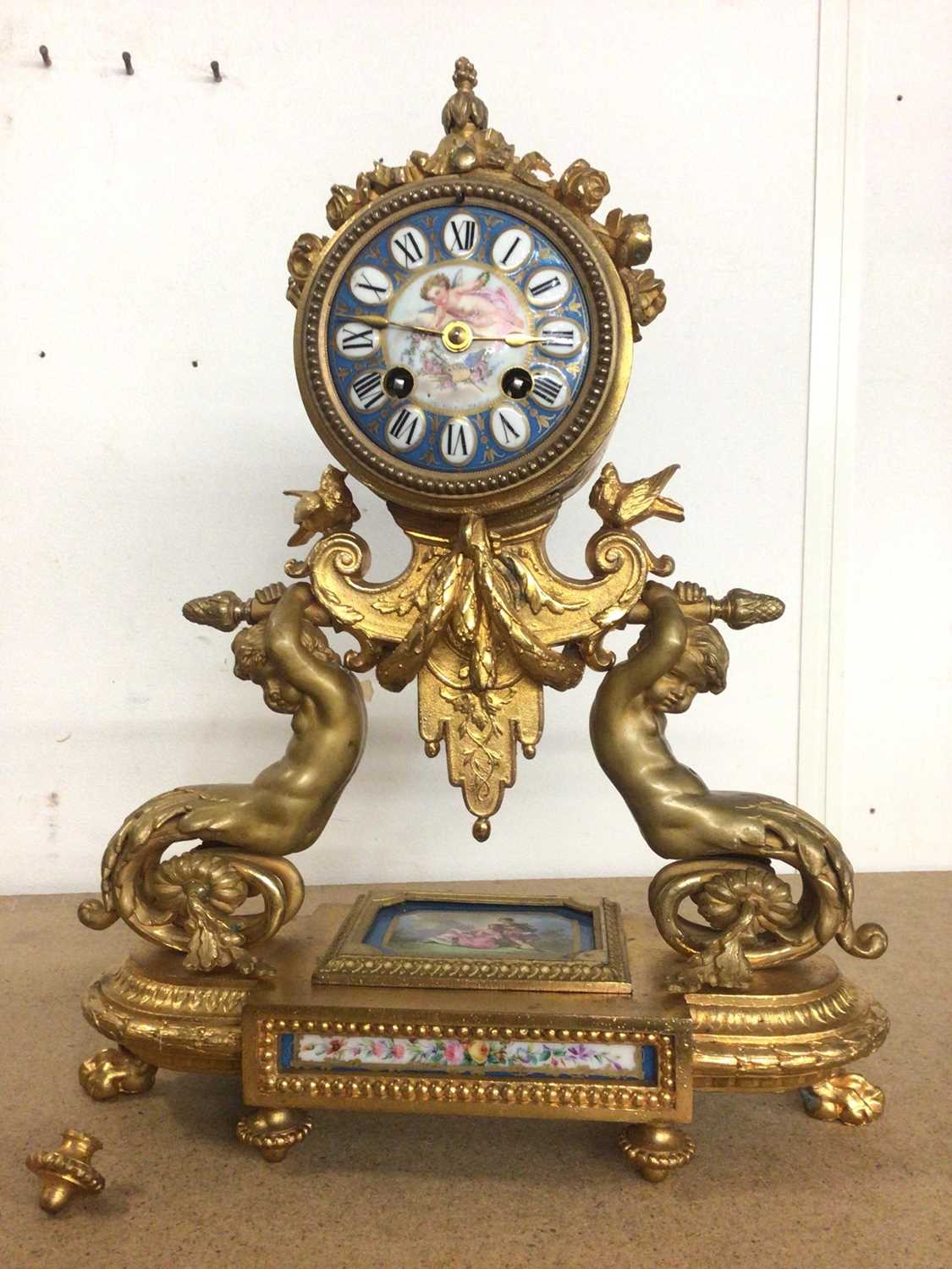 Lot 322 - 19th century French ormolu clock with painted porcelain panels and figure decoration