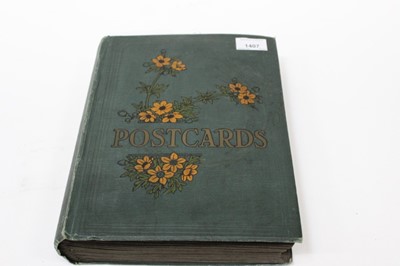 Lot 1407 - Early 20th century postcard album including real photographic topography, lighthouses, street scenes etc.