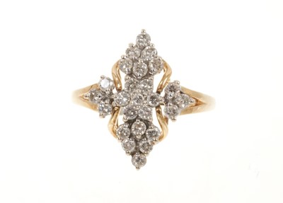 Lot 515 - Diamond cluster ring with a marquise shape cluster of brilliant cut diamonds in claw setting on 18ct yellow gold shank. Estimated total diamond weight 1ct.