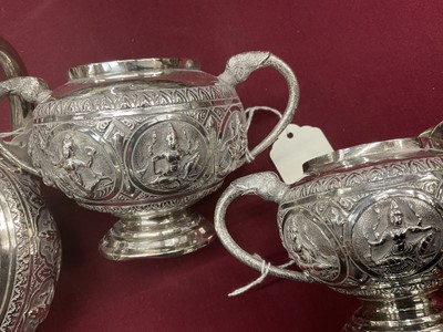 Lot 200 - Late 19th century Anglo-Indian white metal three piece tea set