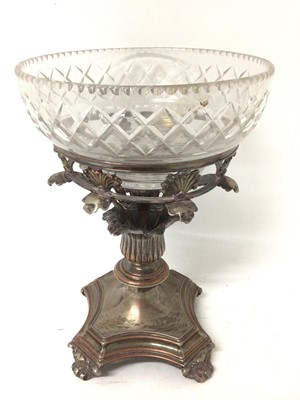 Lot 738 - 19th century Old Sheffield Plate table centrepiece, with cut glass bowl, raised on foliate column and shaped square base on brackets, 29.5cm high