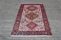 Lot 1201 - Persian tribal rug centred by three lozenge...