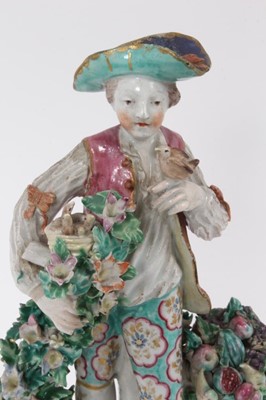 Lot 15 - A Bow figure of a young man with flowers and fruits, circa 1765