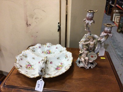 Lot 679 - A Limoges hors d'oeuvres dish, and a Continental porcelain candelabrum