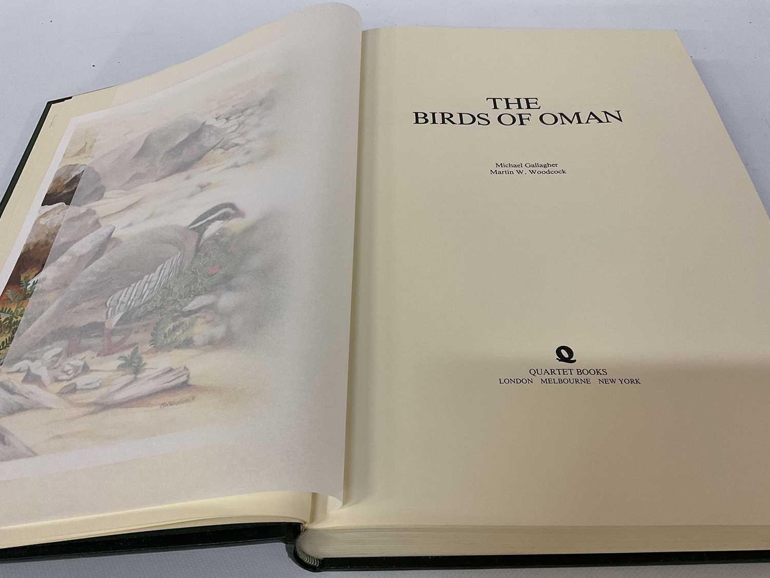 Lot 935 - Michael Gallagher - The Birds of Oman, numbered 51of 500 copies signed by the author and artist, 120 tipped-in colour plates by Martin Woodcock, Quartet Books, 1980, original Morocco, folio 45 x 32...