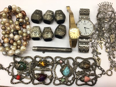 Lot 800 - Small group of costume jewellery including continental silver brooch, multi coloured pearl necklace, two wristwatches and set of six owl menu holders