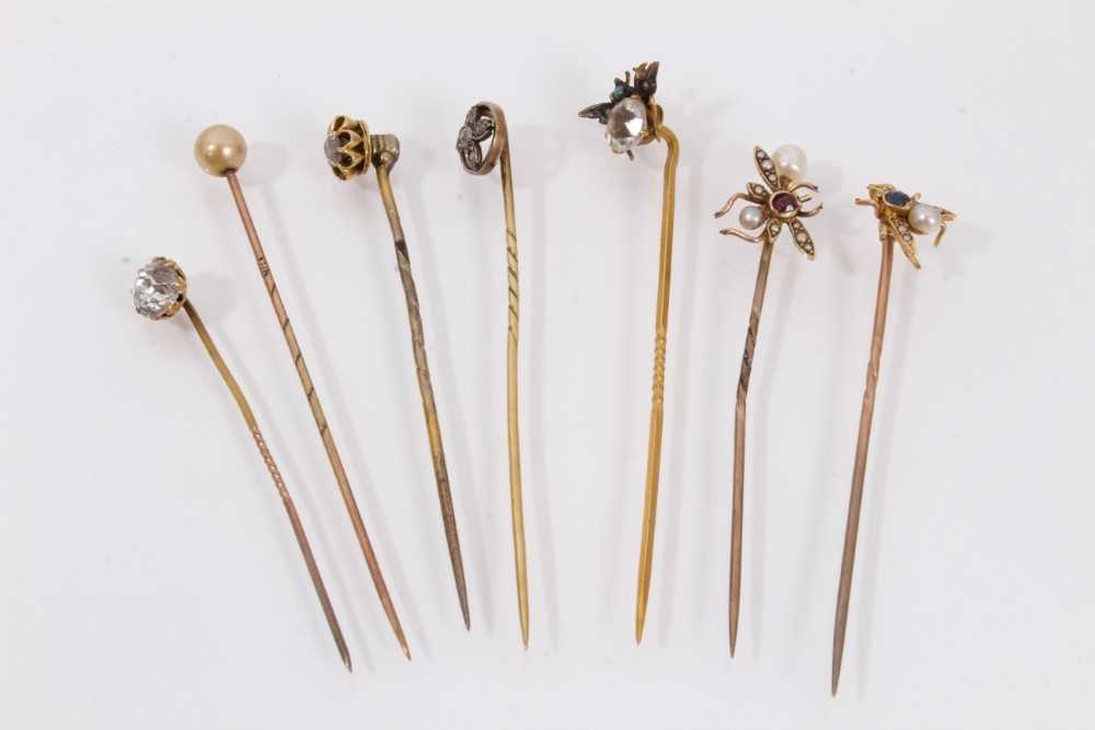 Lot 451 - Seven antique stick pins to include three