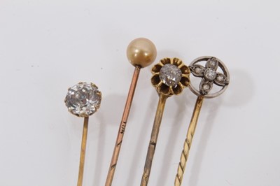 Lot 451 - Seven antique stick pins to include three gold and gem-set novelty insect stick pins