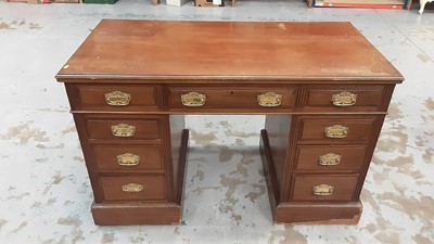 Lot 1009 - Edwardian mahogany twin pedestal desk with an arrangement of nine drawers with brass handles