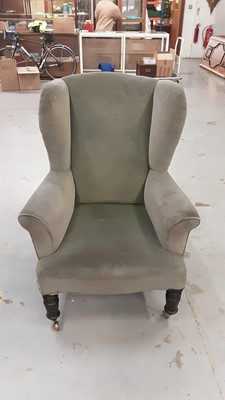 Lot 1006 - Edwardian wing back arm chair on ring turned legs