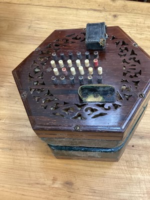 Lot 2214 - Late Victorian rosewood concertina/squeeze box in hexagonal mahogany case