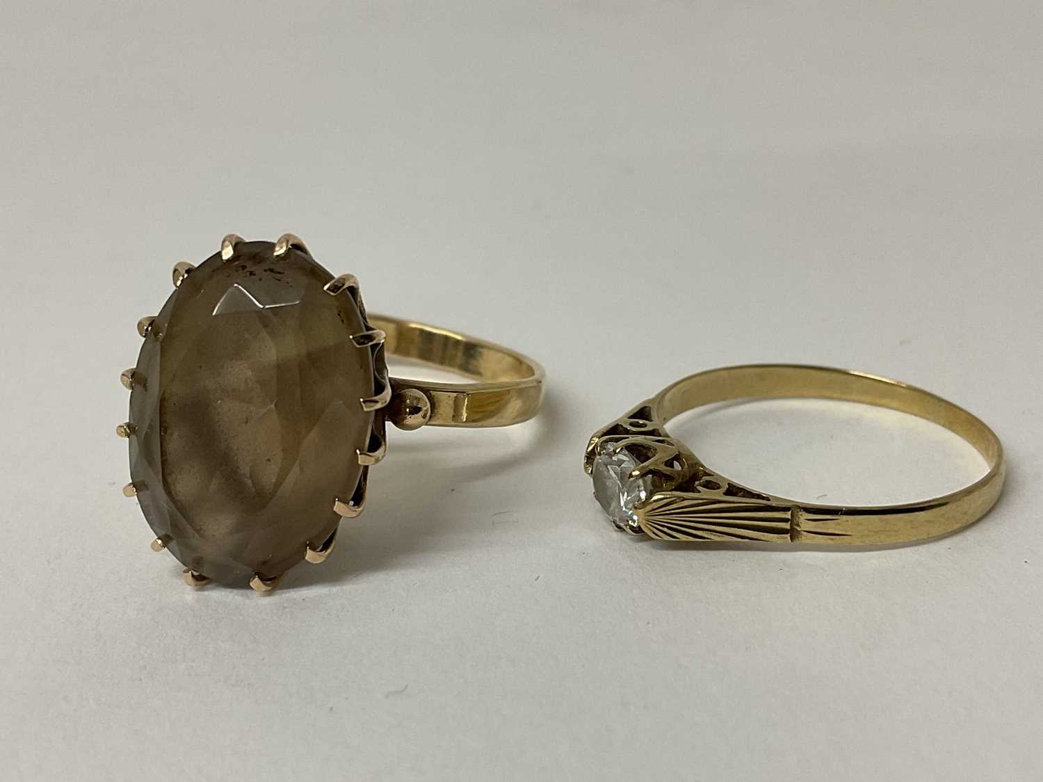 Lot 91 - 14ct gold gem set dress ring, marked 14k, ring size T, together with a 9ct gold single stone ring, ring size S 1/2 (2).