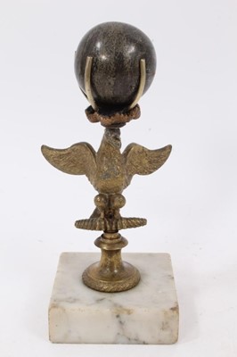 Lot 786 - 19th century Italian Grand Tour desk stand, an eagle with a pyrite sphere finial held by four claws, on a white marble base