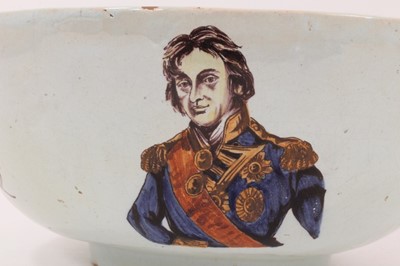 Lot 108 - Unusual polychrome Delft ware bowl, commemorating Nelson, with ship and floral decoration, 29cm diameter