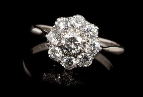 Lot 402 - Diamond cluster ring, the flower-head cluster...