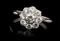 Lot 402 - Diamond cluster ring, the flower-head cluster...