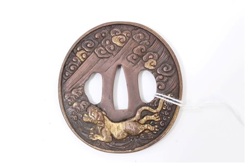 Lot 723 - Japanese Edo period bronze tsuba of circular...