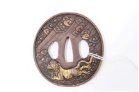 Lot 723 - Japanese Edo period bronze tsuba of circular...