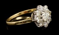 Lot 408 - Diamond cluster ring, the flower-head cluster...