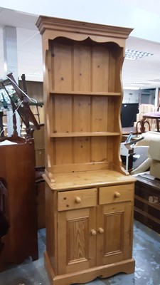 Lot 1022 - Contemporary narrow pine two height dresser with open shelves, two drawers and cupboards below, 69.5cm wide, 36cm deep, 186cm high