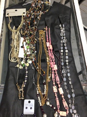 Lot 856 - Small group of costume jewellery, mainly bead necklaces on a jewellery hanger