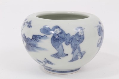 Lot 11 - A Chinese blue and white small porcelain bowl, probably early 20th century, painted with figures and landscapes, double ring mark to base