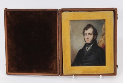 Lot 852 - English School, circa 1830, portrait miniature on ivory depicting a young gentleman in black jacket