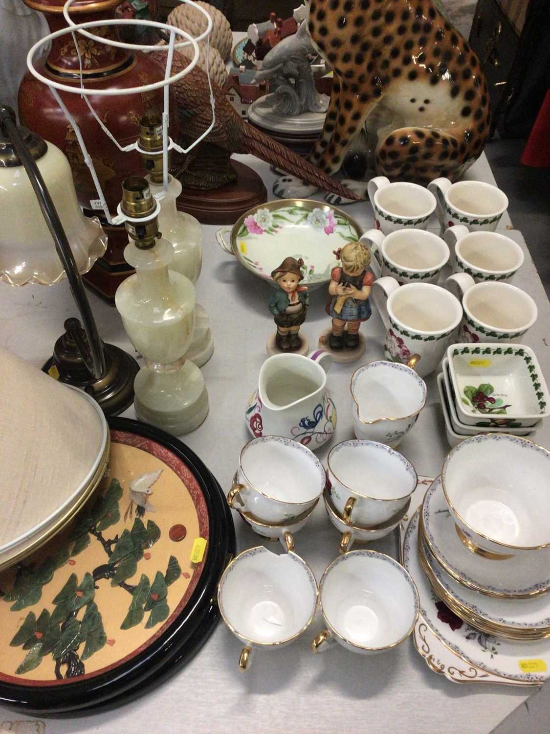 Lot 305 - Portmeirion Pomona mugs and dishes, Poole pottery jug, two Goebel figures, other decorative ceramics and table lamps