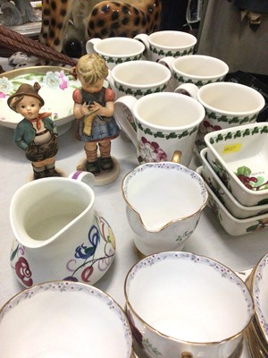 Lot 305 - Portmeirion Pomona mugs and dishes, Poole pottery jug, two Goebel figures, other decorative ceramics and table lamps