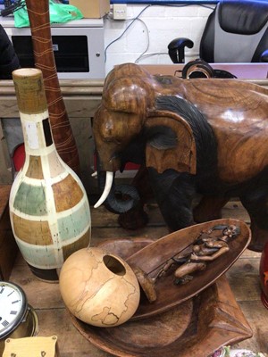 Lot 39 - A large carved wood model of an elephant, together with African carvings, vases, etc