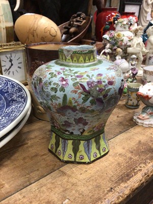 Lot 41 - An 18th century polychrome delft ware vase, decorated in the Chinese style, and a 19th century salt glazed tankard (2)