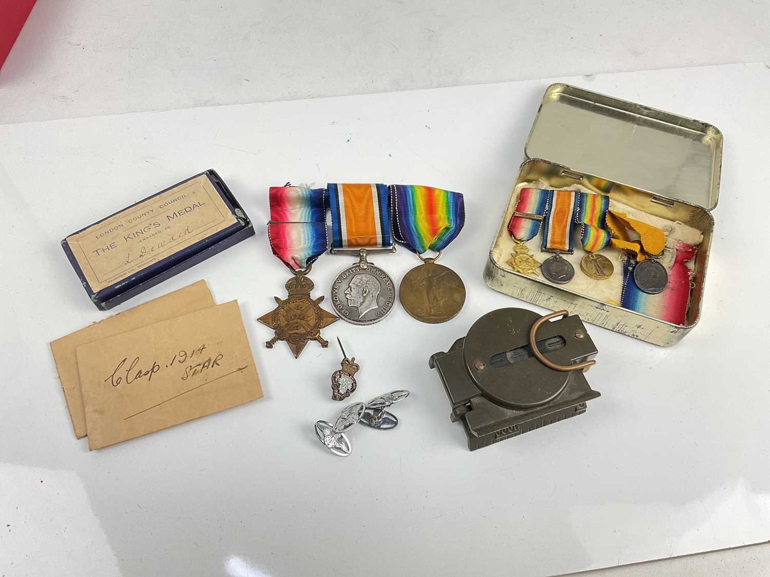 Lot 479 - WWI medal group and miniature group, pair RAF cufflinks and a military compass