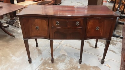 Lot 1033 - George III style mahogany serpentine fronted kneehole sideboard