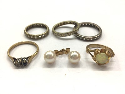 Lot 835 - Two 9ct gold dress rings, three eternity rings and pair of cultured pearl stud earrings