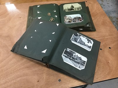 Lot 348 - Two vintage albums containing postcards