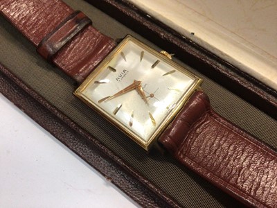 Lot 866 - Two Avia gold plated stainless steel wristwatches on brown leather straps, boxed