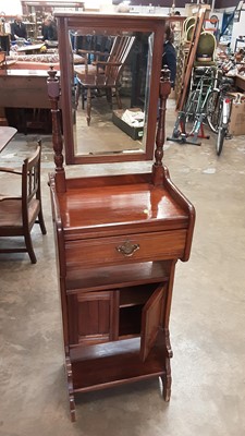 Lot 1030 - Edwardian mahogany valet/dressing stand with bevelled mirror back, drawer and cupboards below, 46cm wide, 33cm deep, 155.5cm high