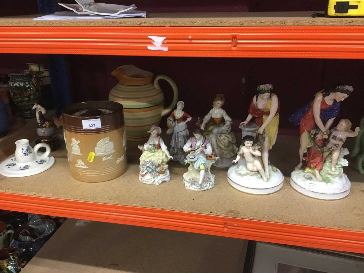 Lot 627 - Group of ceramics, including continental figures, Chinese celadon horses, Doulton Lambeth biscuit jar, etc