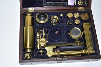 Lot 2432 - 19th century cased brass microscope, in extensively fitted mahogany case.