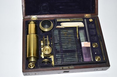 Lot 2432 - 19th century cased brass microscope, in extensively fitted mahogany case.