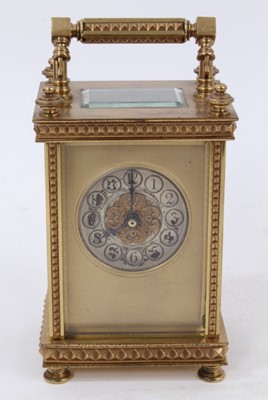 Lot 656 - Early 20th century French carriage clock and leather case.