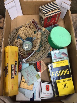Lot 53 - Box of fishing related items, including hooks, a net, a reel, books, etc