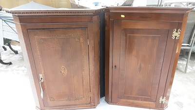 Lot 1089 - George III oak corner cupboard together with a fruit wood corner cabinet