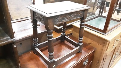 Lot 1039 - Old oak coffin stool with carved frieze on turned legs joined by strenchers 45 cm wide