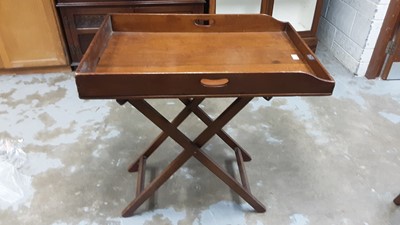 Lot 1040 - Victorian mahogany butlers tray on folding stand. The tray 81 x 55 cm