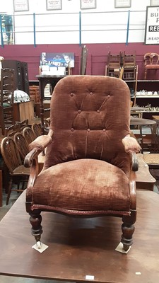 Lot 1046 - Victorian mahogany buttoned back easy chair with brown velvet upholstery on turned legs