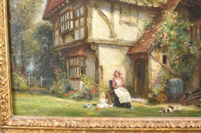 Lot 1199 - Frank Moss Bennett (1874-1952) a pair, oil on board - figures and timbered cottages, both signed and dated 1917, 35cm x 24.5cm, in ornate gilt frames (2)