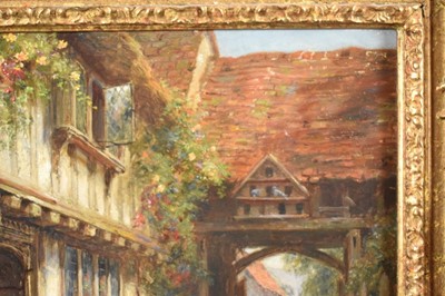 Lot 1199 - Frank Moss Bennett (1874-1952) a pair, oil on board - figures and timbered cottages, both signed and dated 1917, 35cm x 24.5cm, in ornate gilt frames (2)